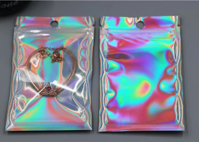 50 Pcs Resealable Smell Proof Bags, Small Holographic Color Resealable Foil Ziplock Pouch For Storage Food, Candy, Chocolate, Coffee Beans, Camping Spices And More, Small (4 X 6 Inches) 3 50 Pcs Resealable Smell Proof Bags, Small Holographic Color Resealable Foil Ziplock Pouch For Storage Food, Candy, Chocolate, Coffee Beans, Camping Spices And More, Small (4 X 6 Inches) - Image 3